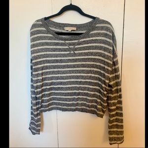 Cropped light sweater